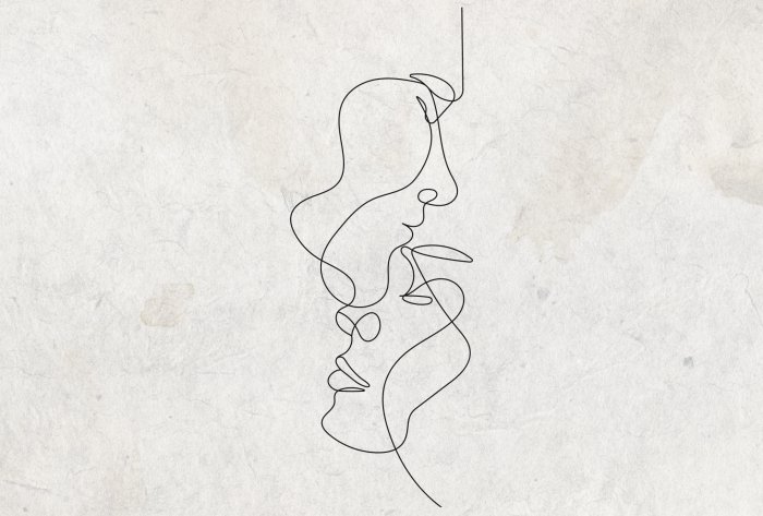 Fototapete Strichzeichnungen von Gesichtern auf Betongrund