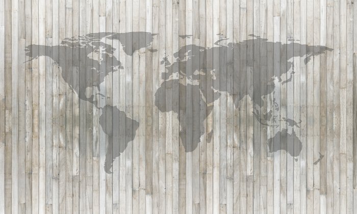 Fototapete Weltkarte auf einem hölzernen Hintergrund