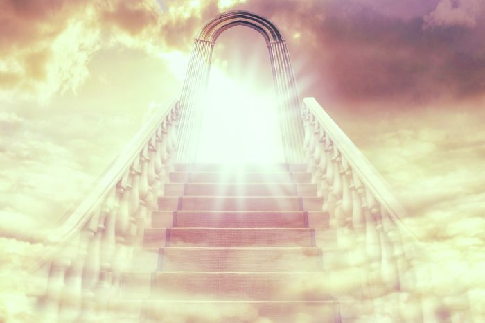 Fototapete Treppen, die zu einem Tor mit Licht führen