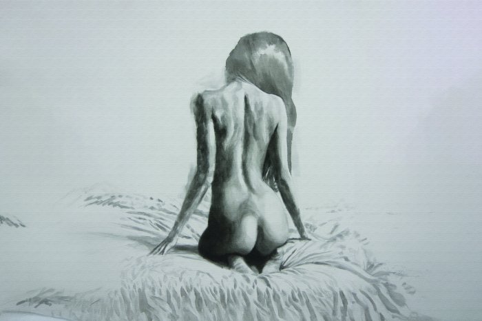 Fototapete Minimalistisches Porträt einer Frau, die auf einem Bett sitzt