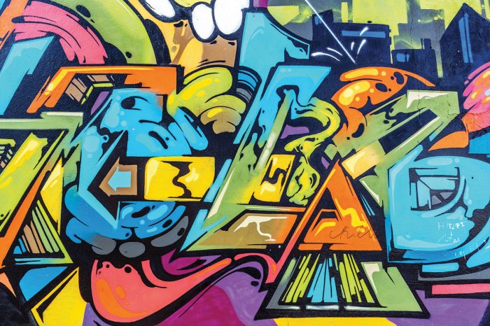 Fototapete Farbige künstlerische Graffiti an der Wand