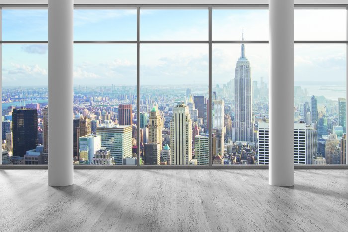 Fototapete Blick vom Wolkenkratzer auf eine große Stadt