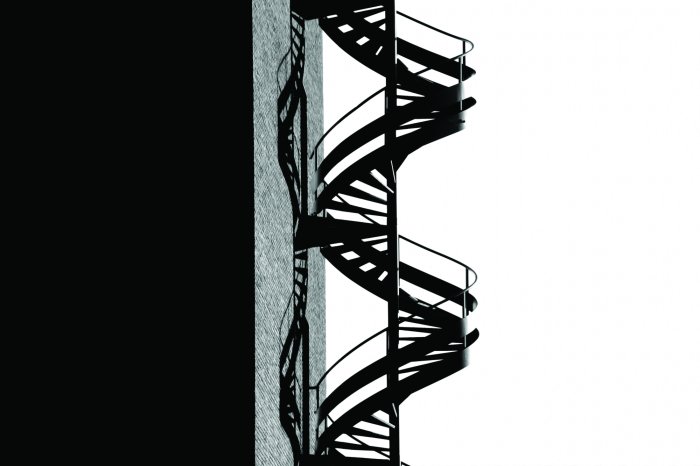 Fototapete Schwarze metallene Wendeltreppe