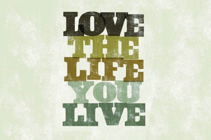 Fototapete Schriftzug über die Liebe zum Leben auf Beton