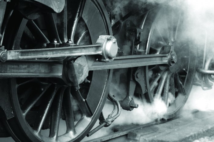 Fototapete Schwarz-weißes Foto von Zugrädern
