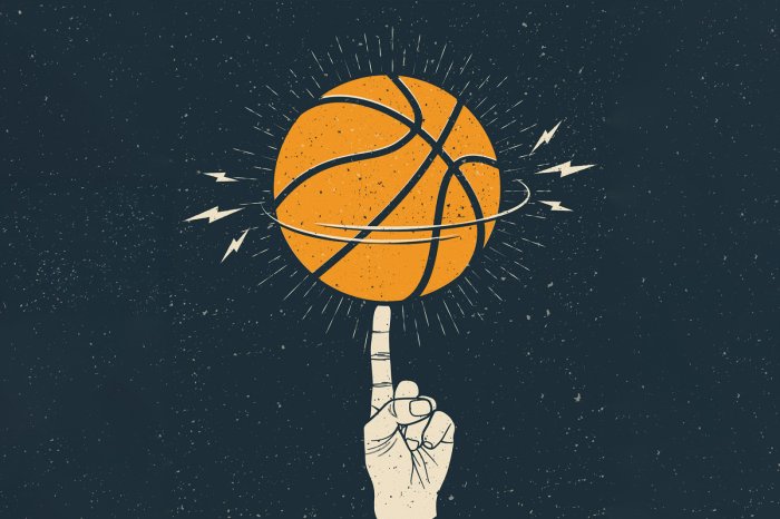 Fototapete Basketball, der sich auf einem Finger dreht