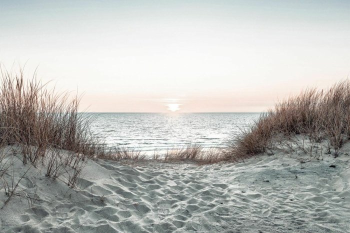 Fototapete Sonnenuntergang über dem Meer und Sandstrand malerische Landschaft