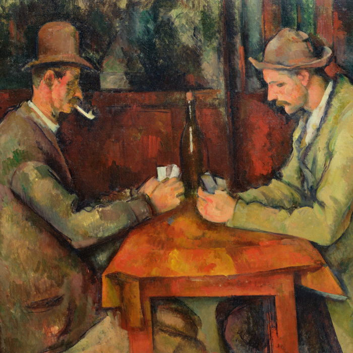 Bild Herren spielen Karten an einem Tisch in einer Bar