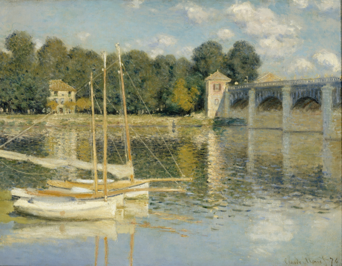 Bild Malerische Boote auf dem Fluss mit Blick auf die historische Brücke