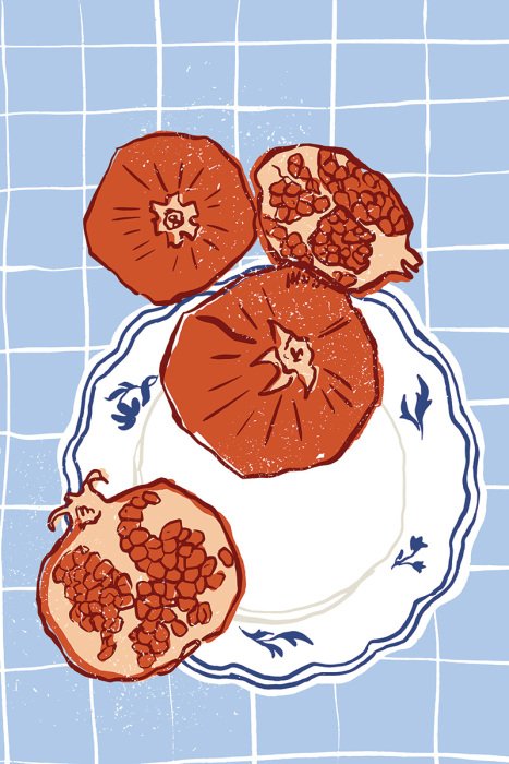 Bild Dekorativer Teller mit reifen Granatäpfeln