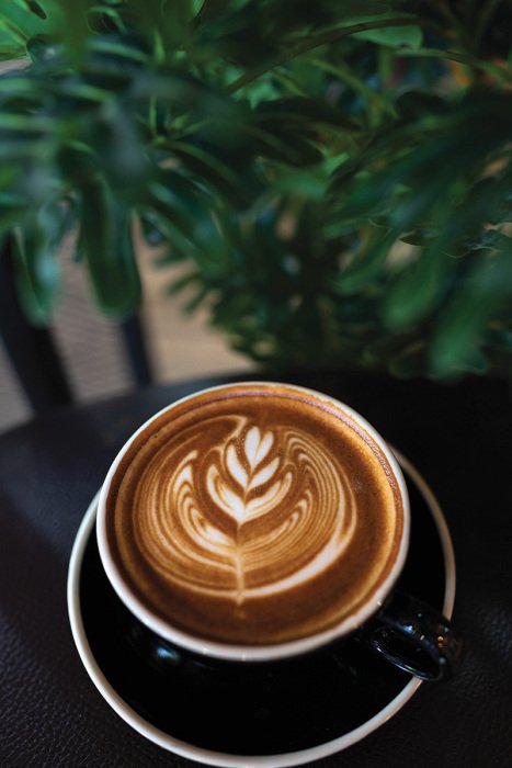 Bild Künstlerische Dekoration von Kaffee mit Milch in einer Tasse