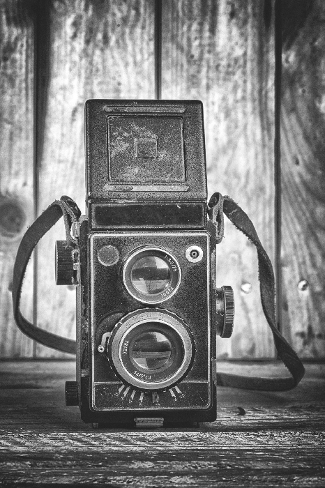 Poster Porträtaufnahme mit einer Vintage-Analogkamera