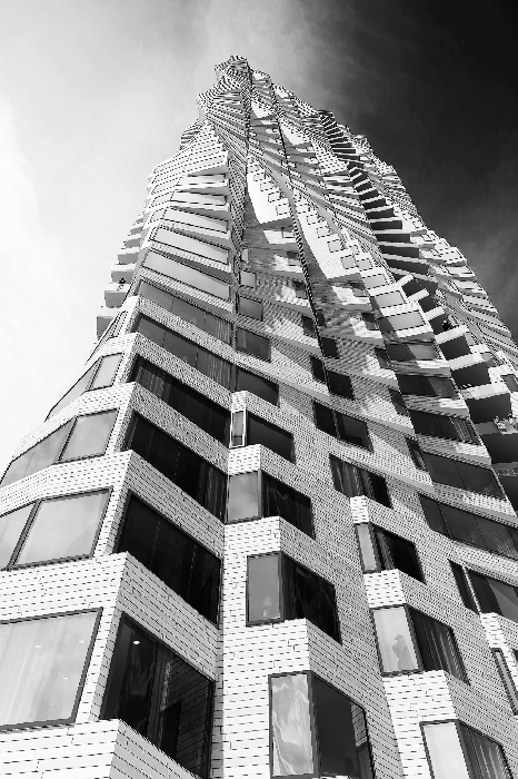 Poster Die Fassade eines modernen Wolkenkratzers