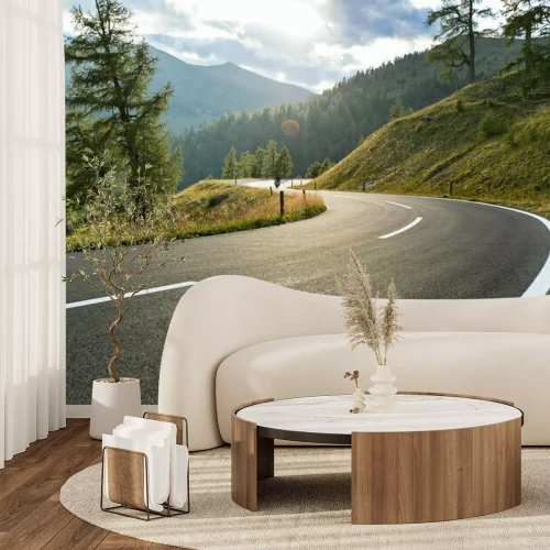 Fototapete Eine asphaltierte Straße in den Bergen