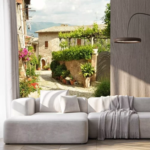 Fototapete Gasse mit Blumen am Fenster