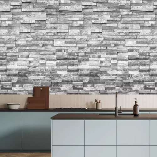 Fototapete Eine Mauer aus unebenen Steinen