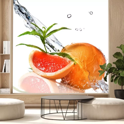 Sticker Wasserspritzen auf Grapefruit mit Minze, isoliert auf weiss