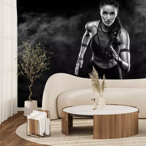 Fototapete Schwarz-weißes Foto einer laufenden Frau