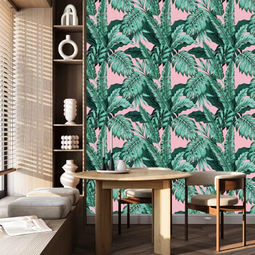 Tapete Große tropische Blätter auf rosa Hintergrund