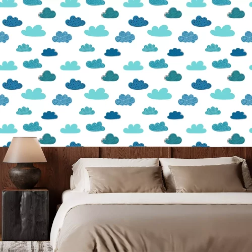Tapete Beautiful seamless pattern of doodle clouds. design background greeting cards and invitations and for baby clothes.