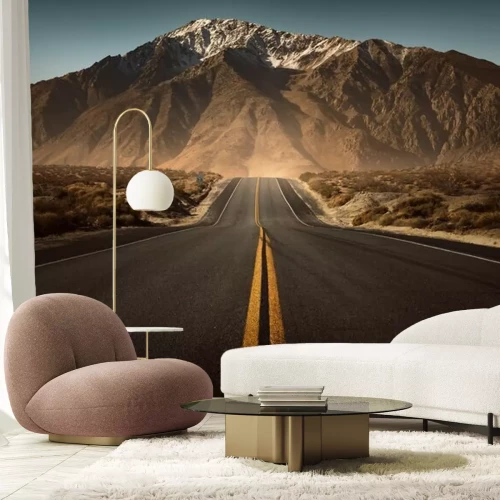 Fototapete Leere Autobahn die in die Berge führt