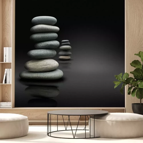 Sticker Entspannung sur fond noir, Pierres empilées Zen-Haltung