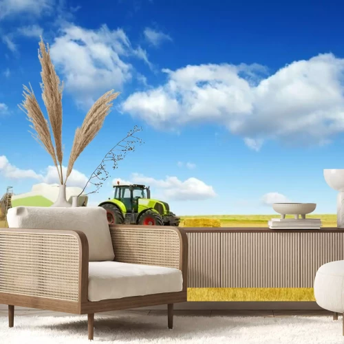 Fototapete Grüner Traktor bei der Arbeit auf dem Feld