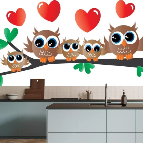 Sticker süße Eulenfamilie, die auf einem Zweig sitzt