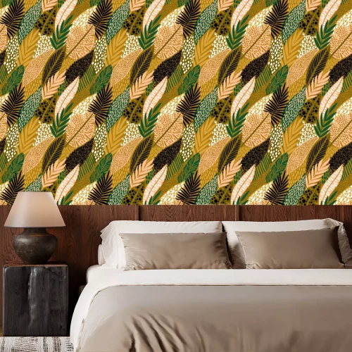 Tapete Tropische Blätter auf gelbem Hintergrund