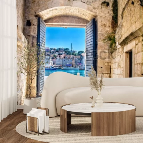 Fototapete Ein Tor mit Blick auf eine mediterrane Stadt