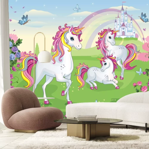 Fototapete Märchenhafte Einhörner zwischen Blumen mit Schloss und Regenbogen
