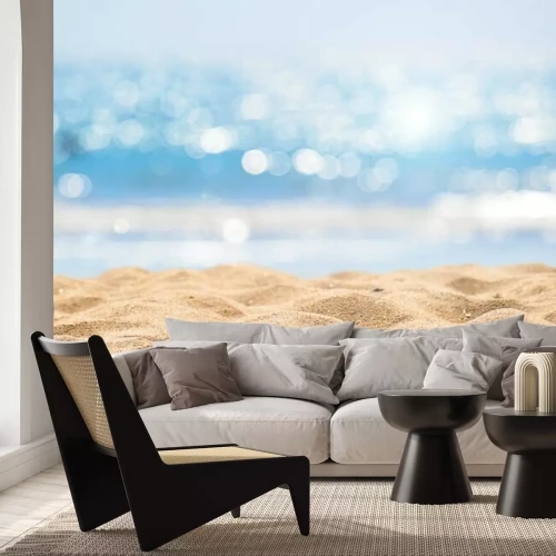 Fototapete Strand mit schimmerndem Meer im Hintergrund