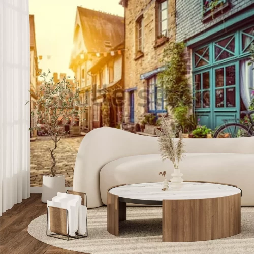 Fototapete Eine Kopfsteinpflasterstraße bei Sonnenuntergang