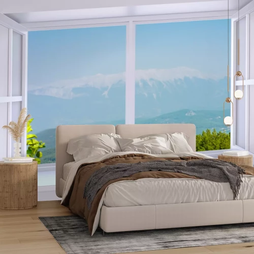 Fototapete Ein Fenster mit Blick auf eine Berglandschaft