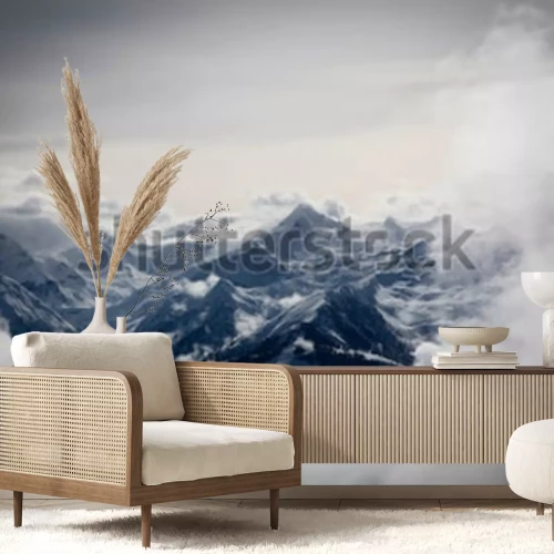 Fototapete Berge in weißen Wolken