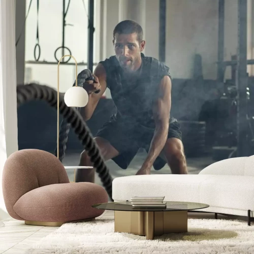 Fototapete Muskelbepackter Mann, der mit einem Seil trainiert