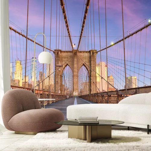 Fototapete New York, New York on the Brooklyn Bridge Promenade facing Manhattan's skyline at dawn.