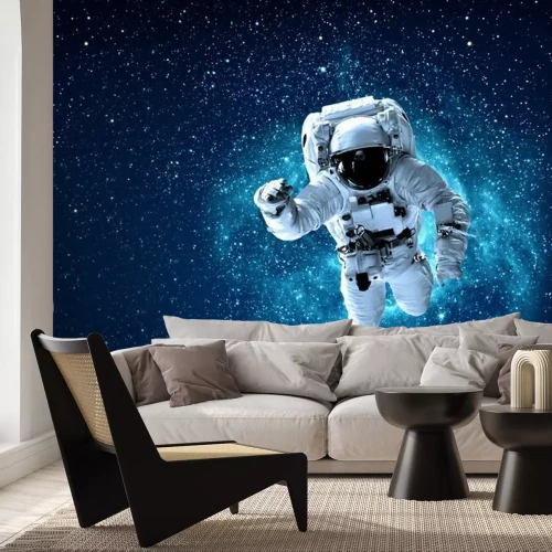 Fototapete Im Weltraum schwebender Astronaut