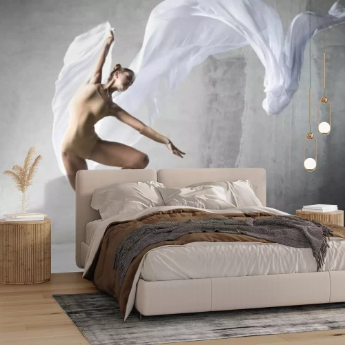 Fototapete Frau tanzt Ballett vor einem Betongegenstand