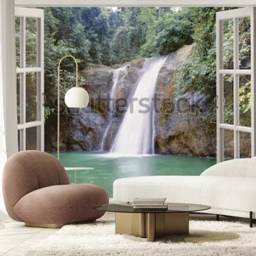 Fototapete Eingerahmter Wasserfall in einem tropischen Waldfenster