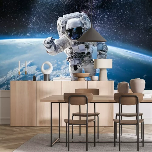 Fototapete Astronaut über dem Planeten Erde