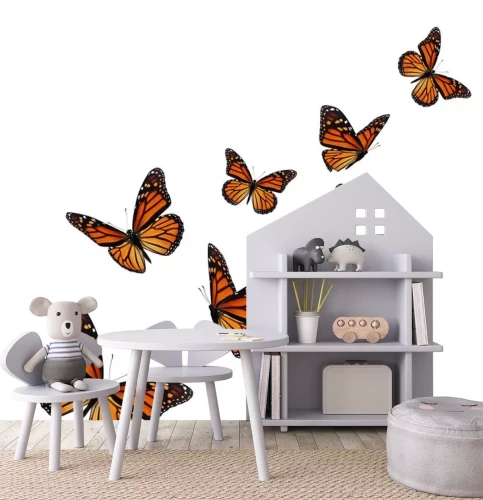 Sticker Orange-schwarze Schmetterlinge in die Luft steigend