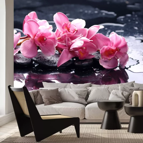 Sticker Pinkfarbene Orchidee auf der Wasseroberfläche