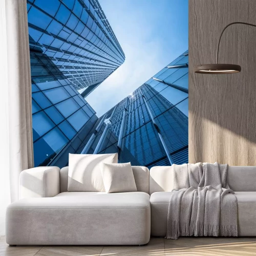 Sticker Wolkenkratzer vor dem Hintergrund eines azurblauen Himmels