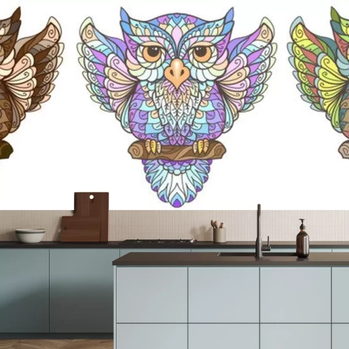 Sticker Owl. Wall sticker. Set of 3 artistic, hand-drawn, decorative multicolored owls on a white background.