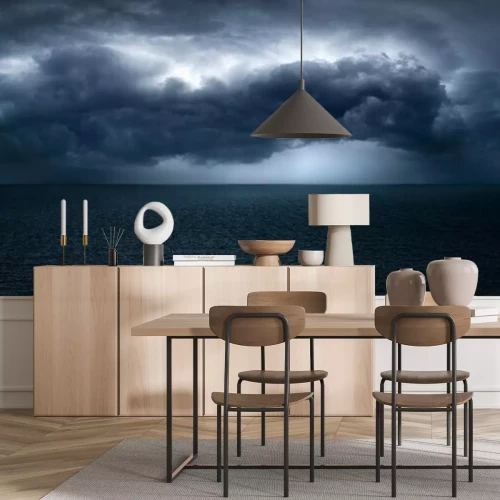 Fototapete Wolken über dem dunklen Meer