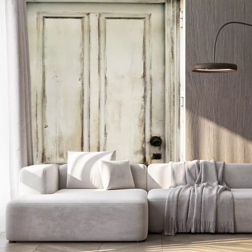 Sticker Old worn white door damaged and with ancient texturee from an abandoned building