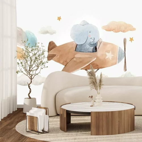 Fototapete Cute watercolor artwork with baby elephant on the plane with air baloons, clouds and stars. Stock illustration.