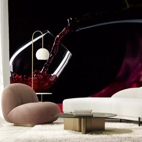 Fototapete Rotwein in ein Glas eingießen