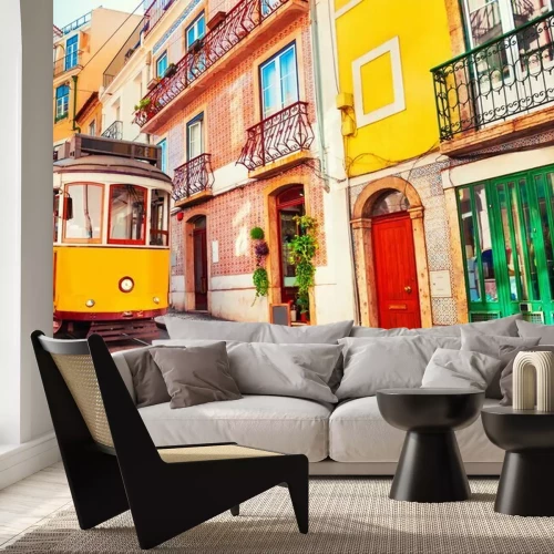Fototapete Yellow vintage tram on the street in Lisbon, Portugal. Famous travel destination
